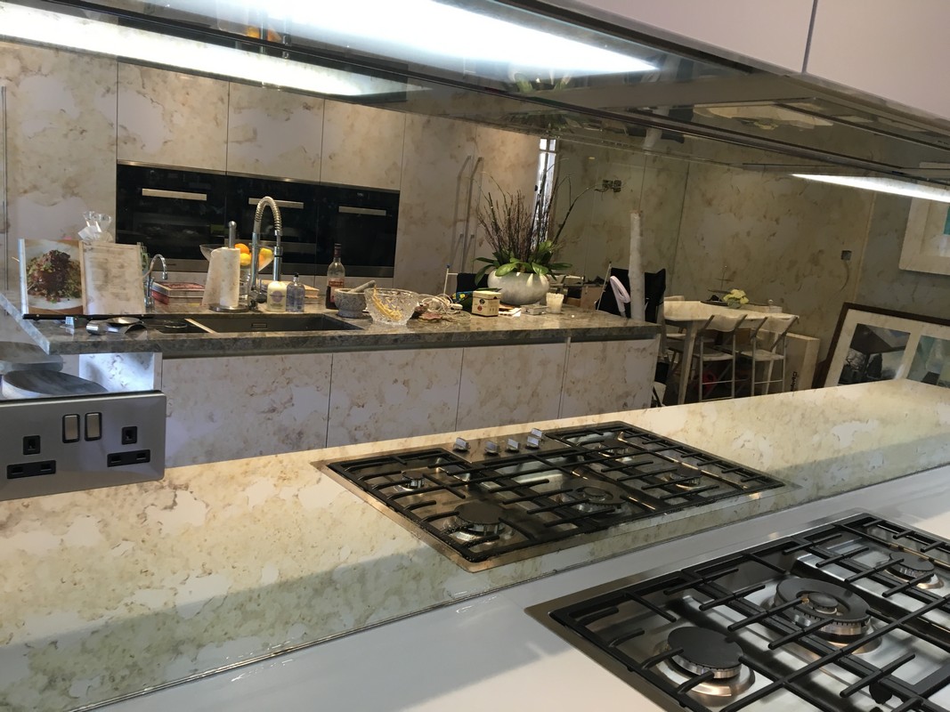 Mirror glass splashback in Waltham Abbey luxury kitchen